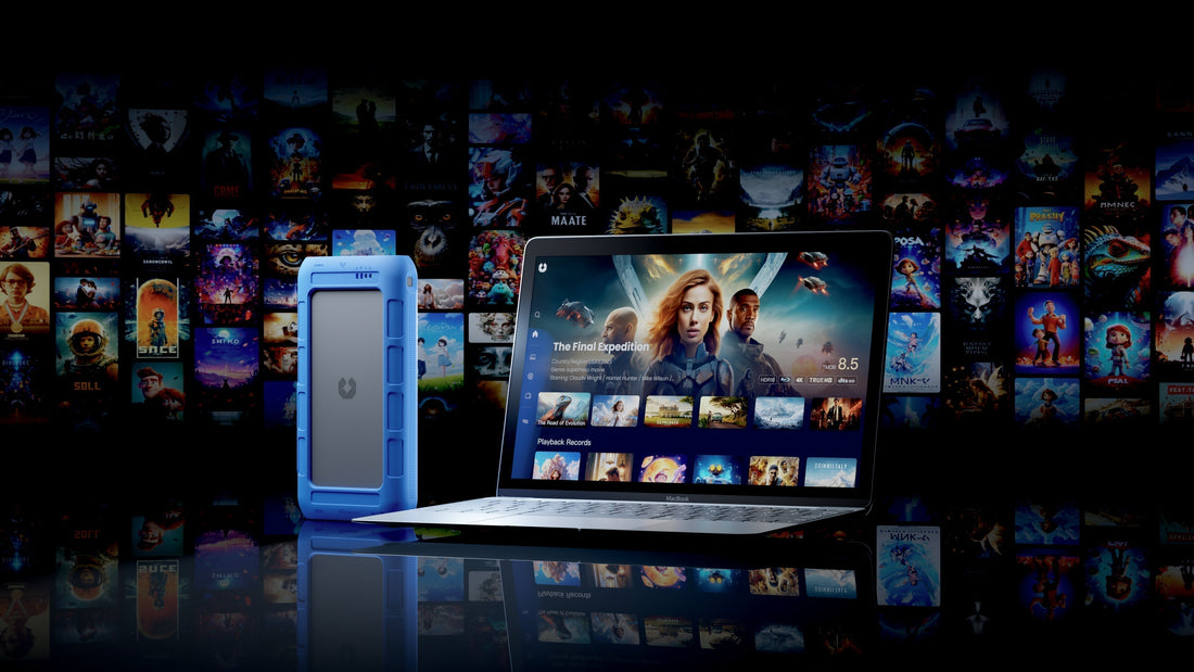 UnifyDrive Portable UT2 next to a laptop displaying a movie library interface with posters and streaming options.